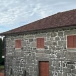 stone-building-red-windows